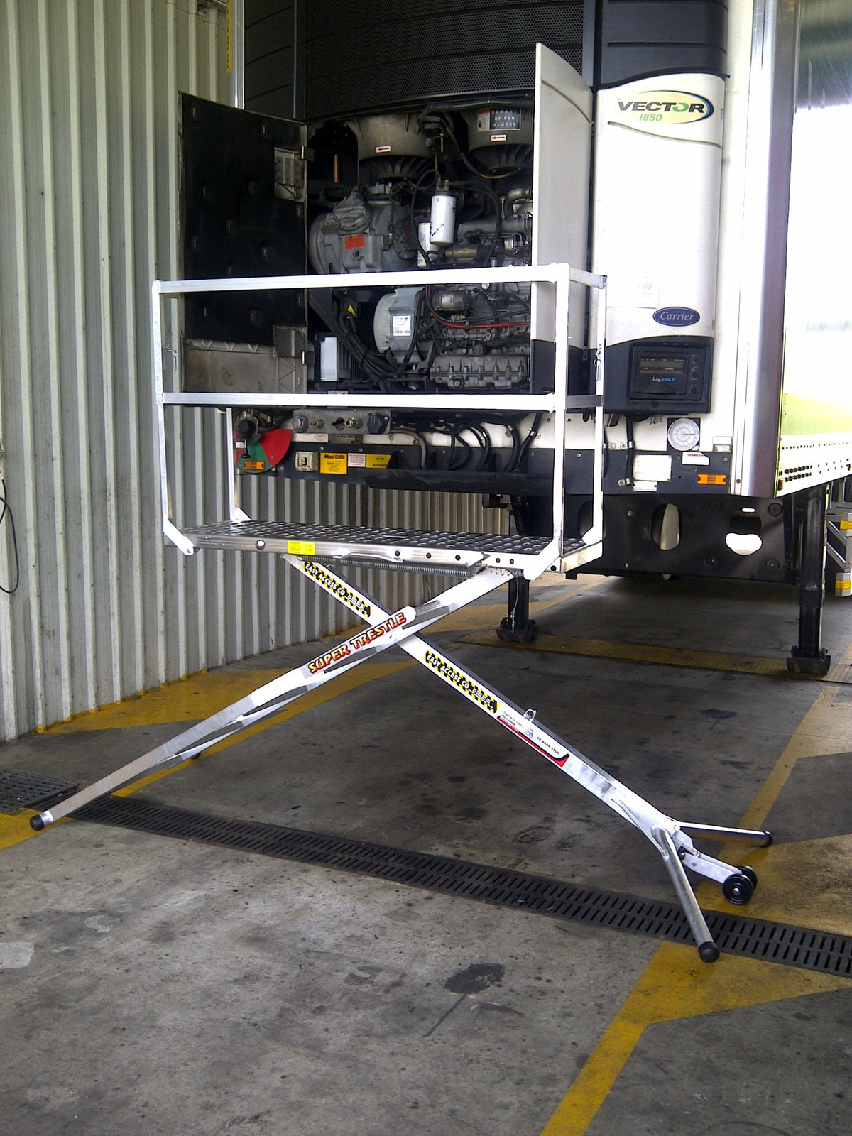 Core Engineering Depot SafeSmart Super Trestle Scaffold for access safety, shown assembled with sturdy metal frame and platform.