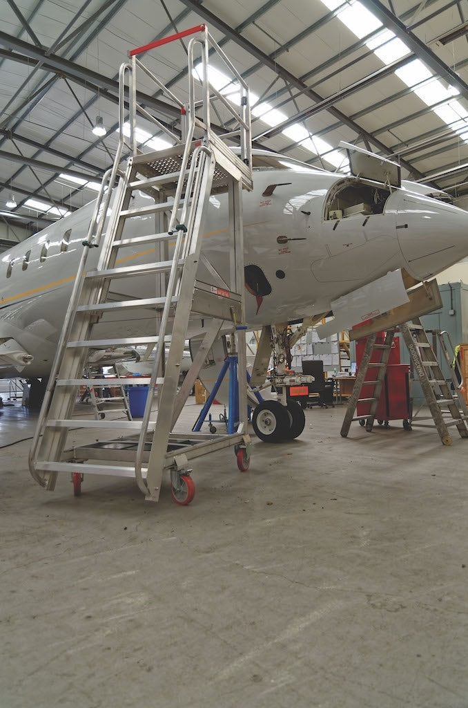 Core Engineering Depot EasyRaise mobile access steps with platform, featuring safety rails and sturdy design for secure access.