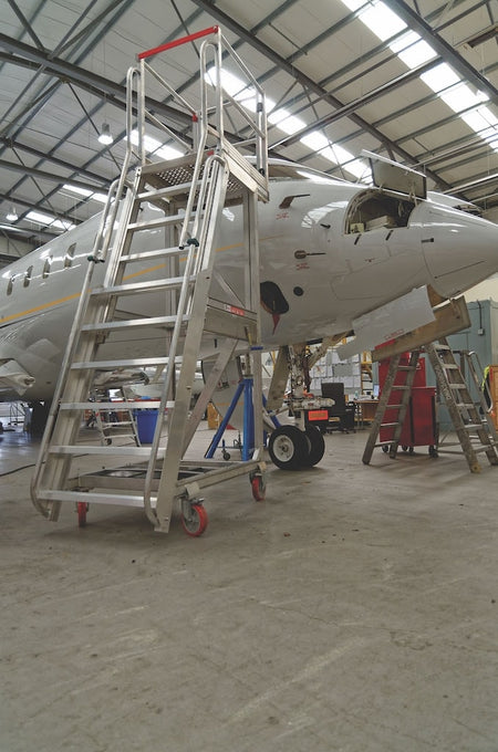 Core Engineering Depot EasyRaise mobile access steps with platform, featuring safety rails and sturdy design for secure access.
